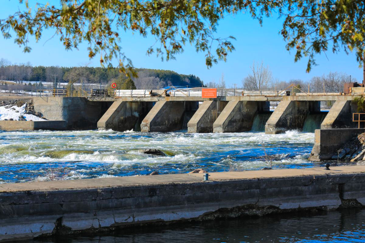 A large dam holding back a vast expanse of water.